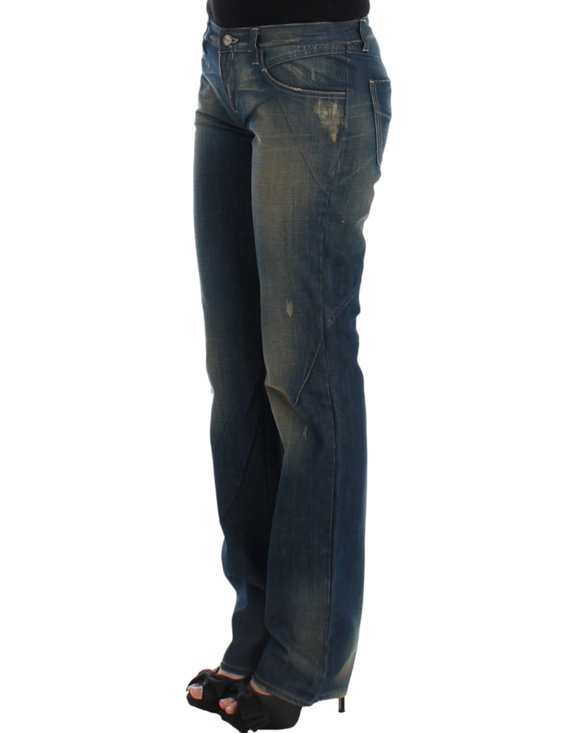 Woman wearing blue jeans and black sandals