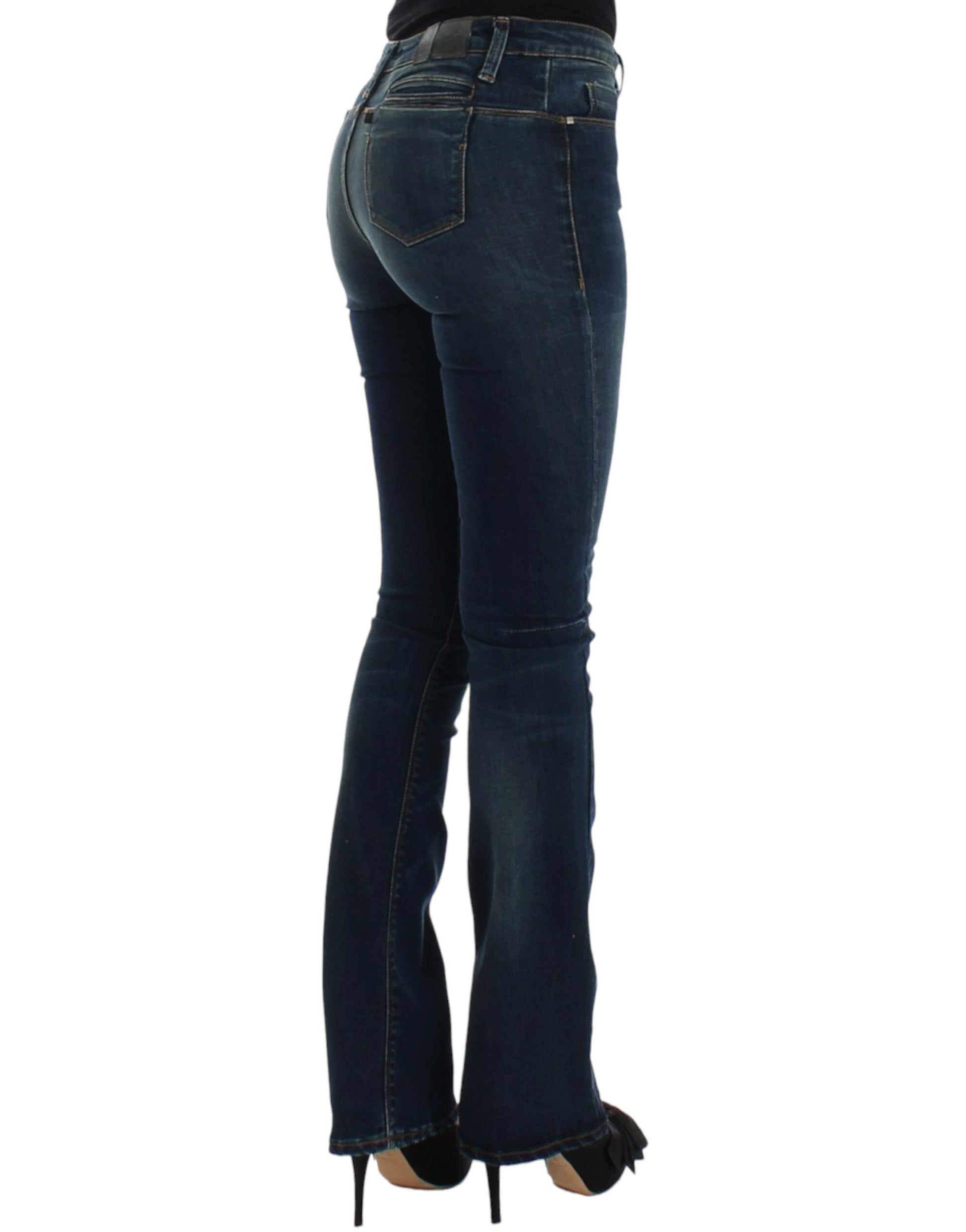 Pair of blue jeans with faded wash and rips at knees