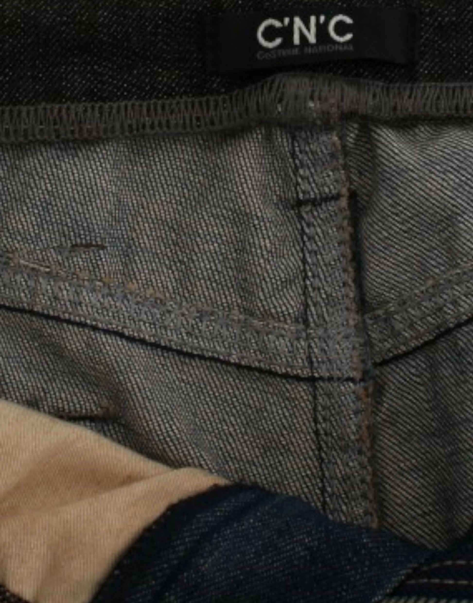 Pair of blue jeans with visible brand label