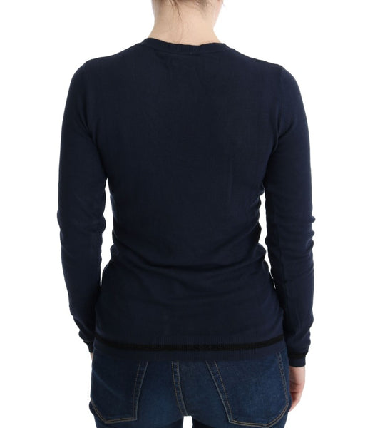 Navy blue long sleeve sweater on woman's back