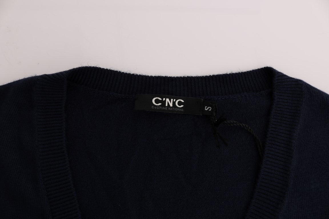 Navy blue sweater with tag on neck