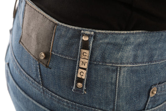 Blue denim jeans with belt loops and a zipper fly