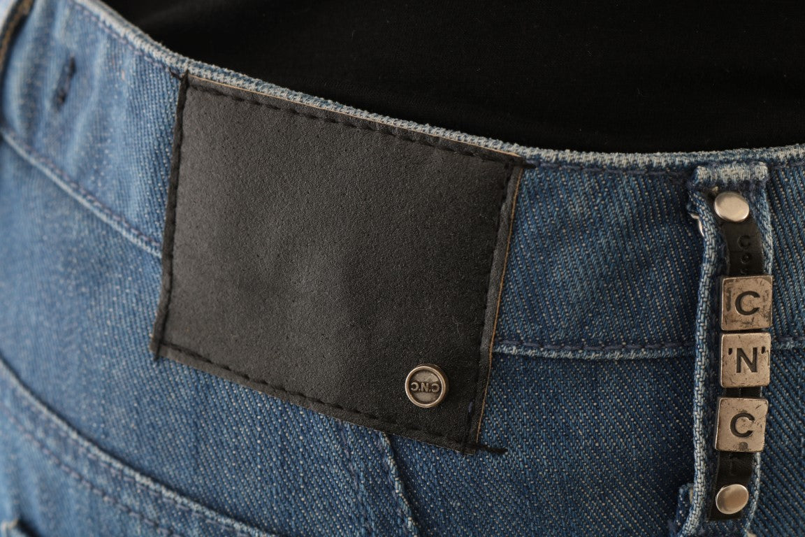 Blue jeans with black leather patch on waistband