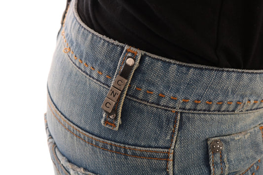 Blue denim jeans with belt loop and button closure