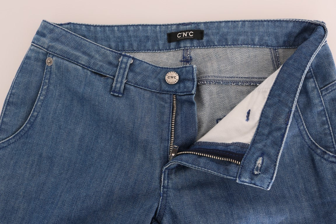 Blue denim jeans with zippered front pockets