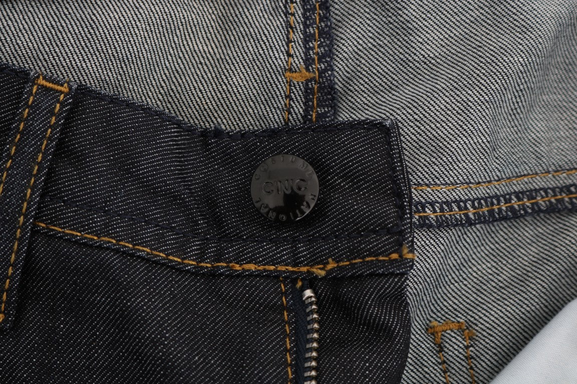 Blue denim jeans with button closure