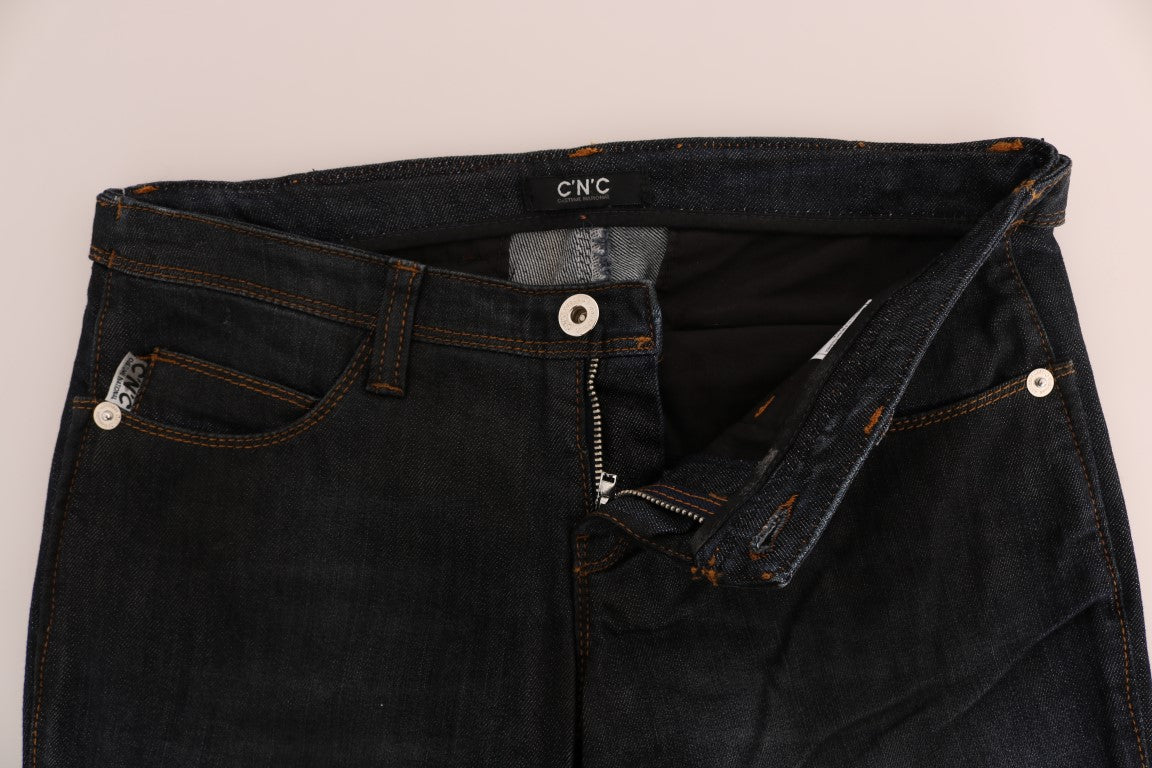 Pair of blue jeans with zipper and button closure