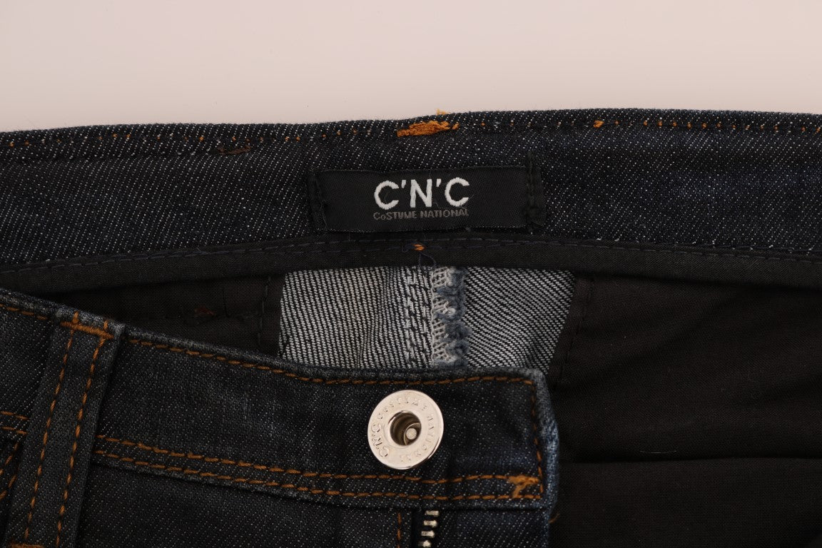Pair of blue jeans with button closure