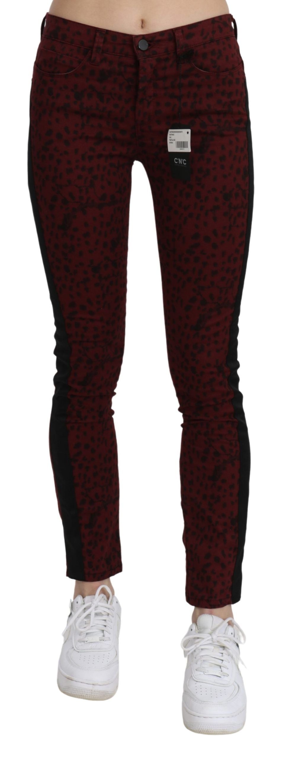 Red patterned jeans on a mannequin