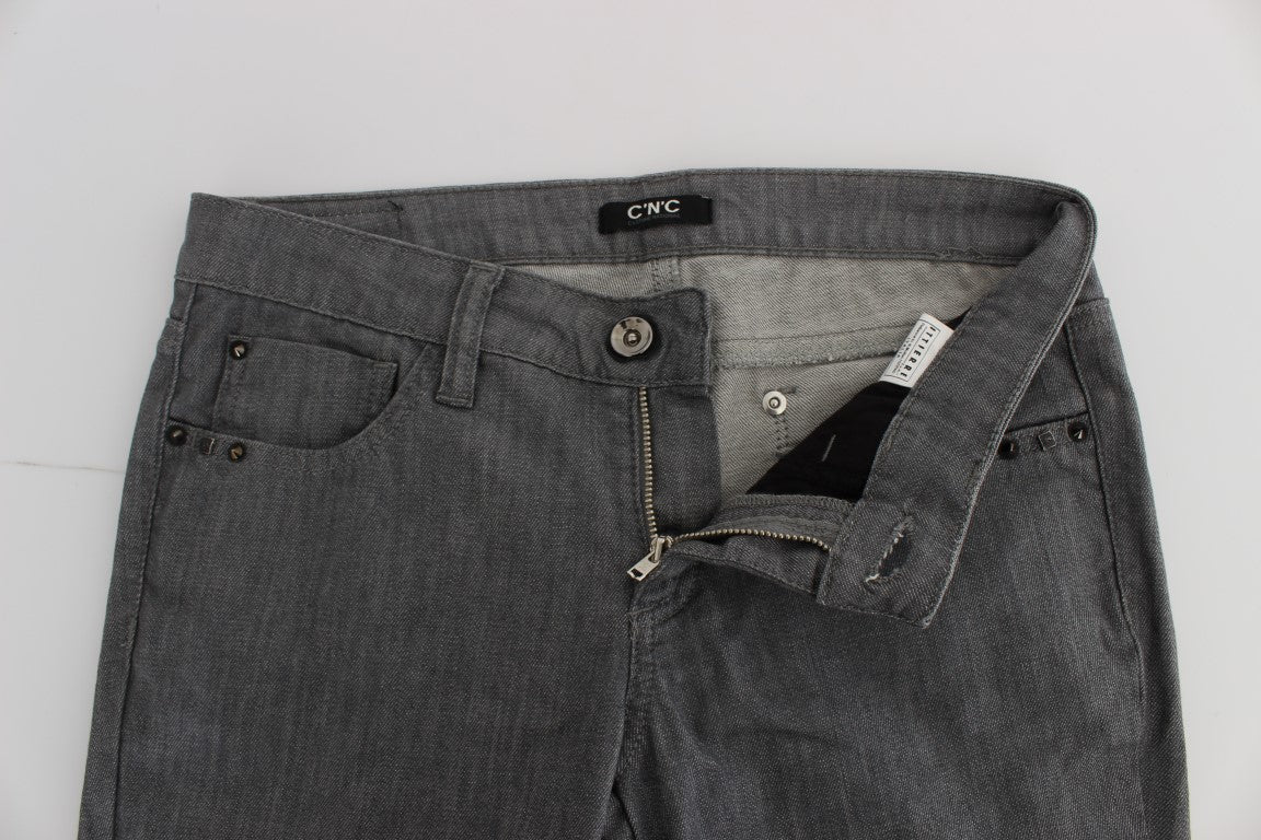 Pair of grey jeans with zipper and button closure