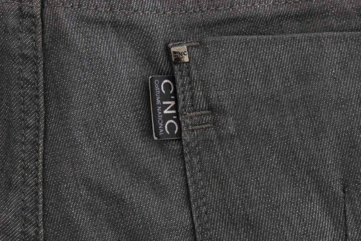 Black denim jeans with a visible brand label on the waistband
