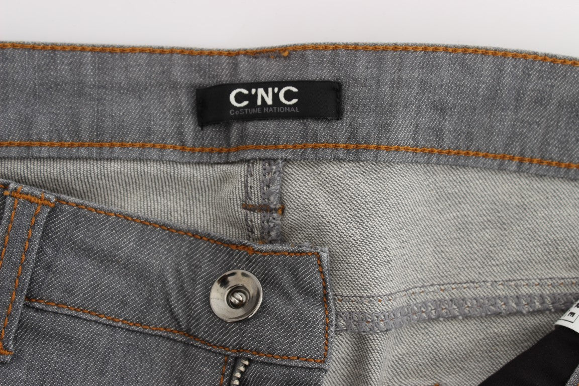 Pair of blue jeans with a button closure