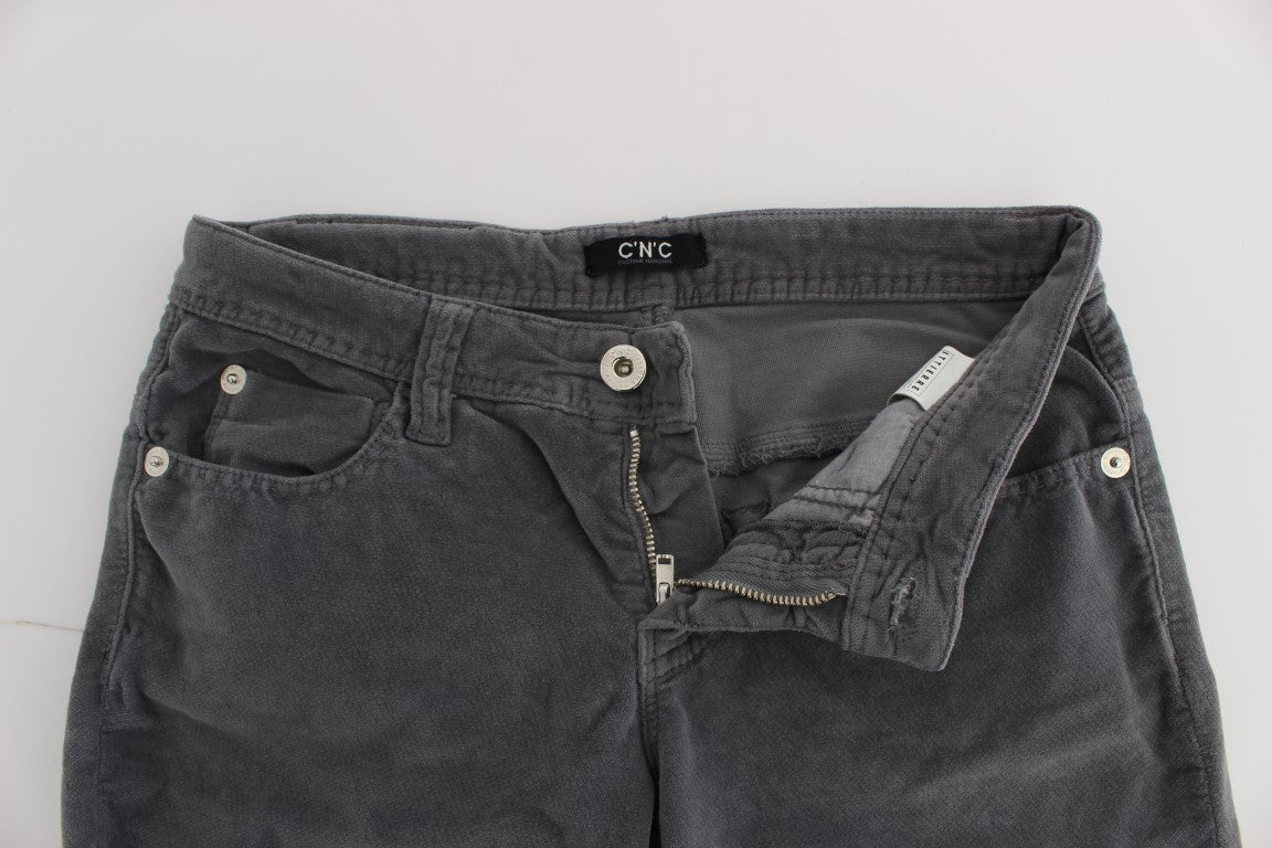 Pair of dark blue denim shorts with zippered pockets