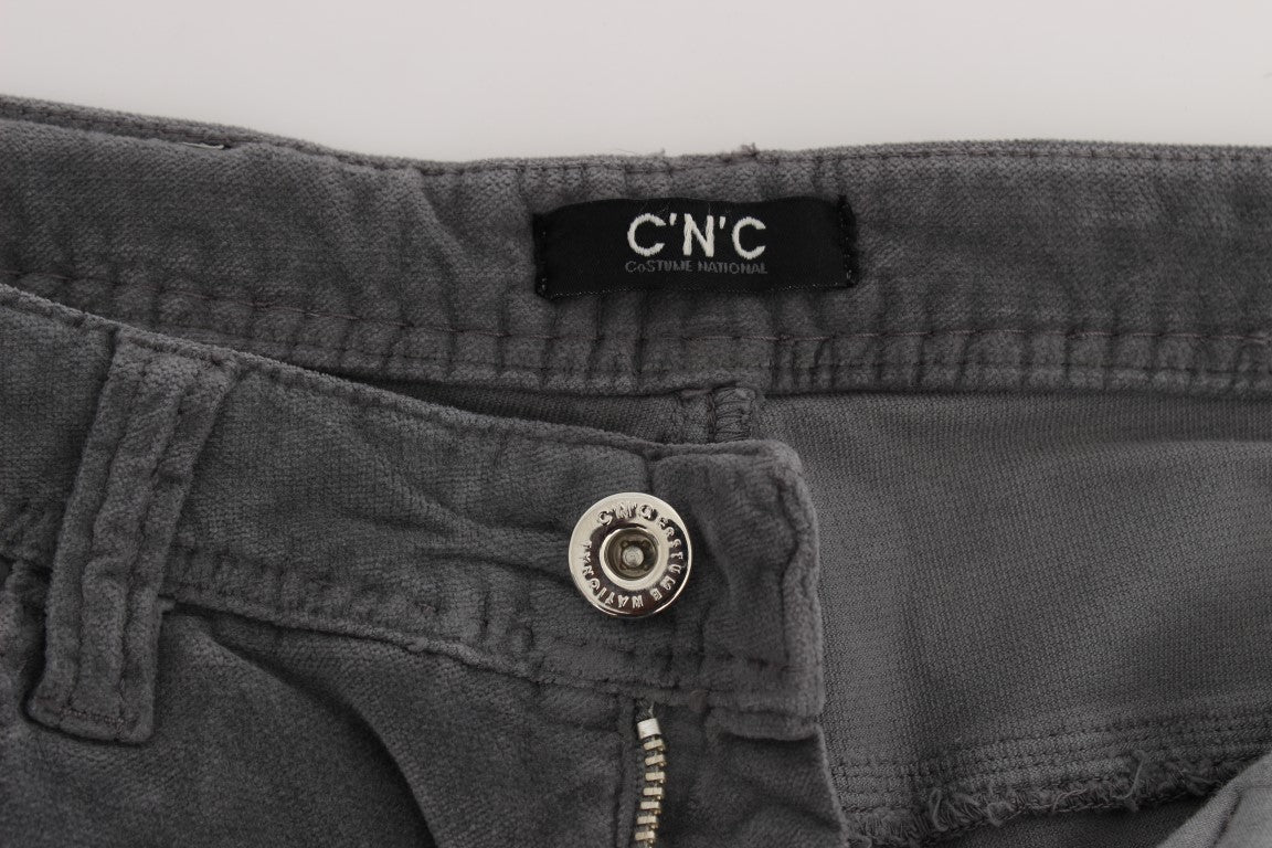 Pair of grey jeans with button closure
