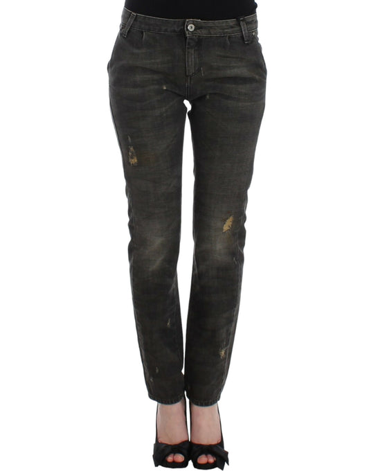 Pair of women's jeans with distressed design and faded areas