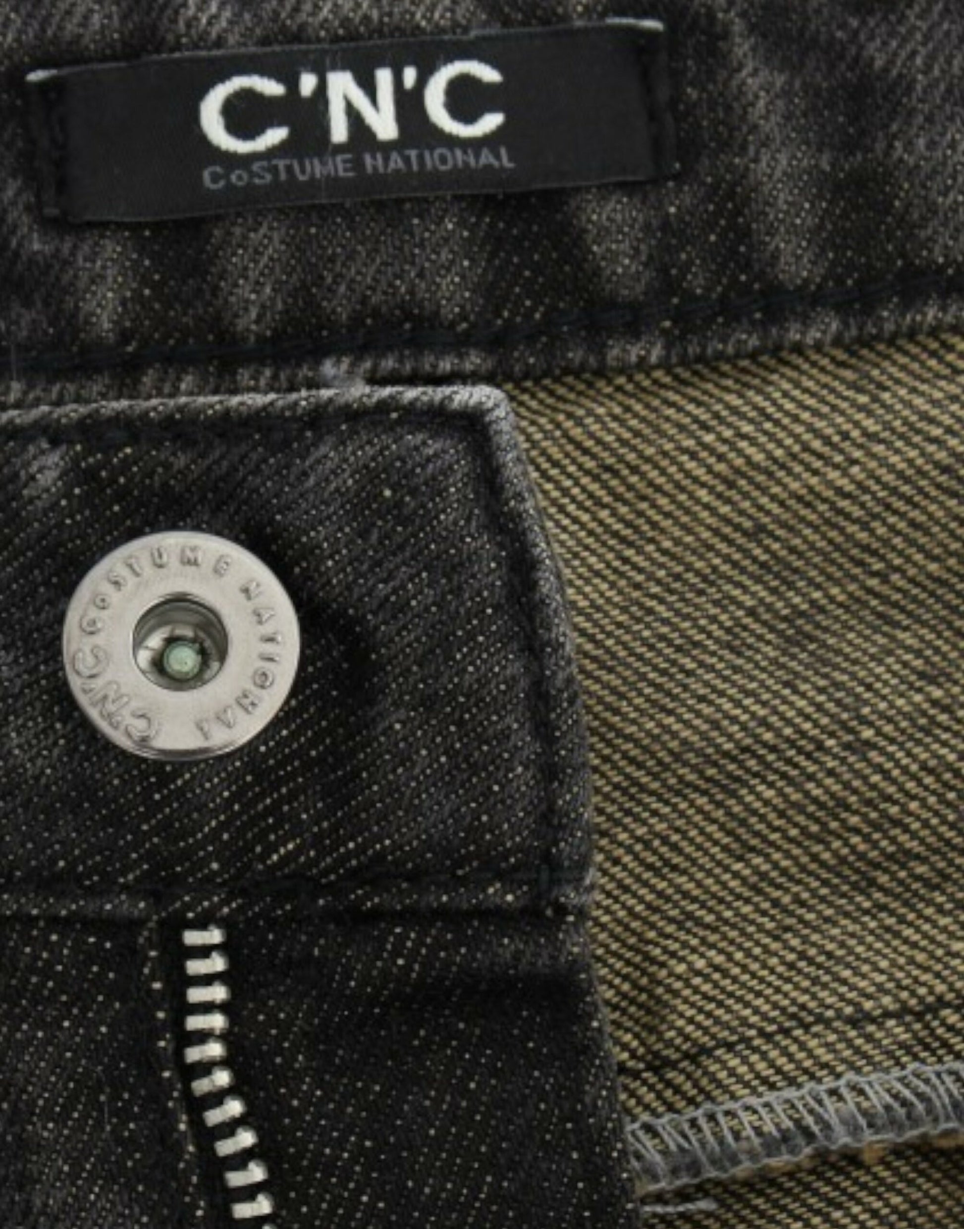 Pair of jeans with a button and zipper closure