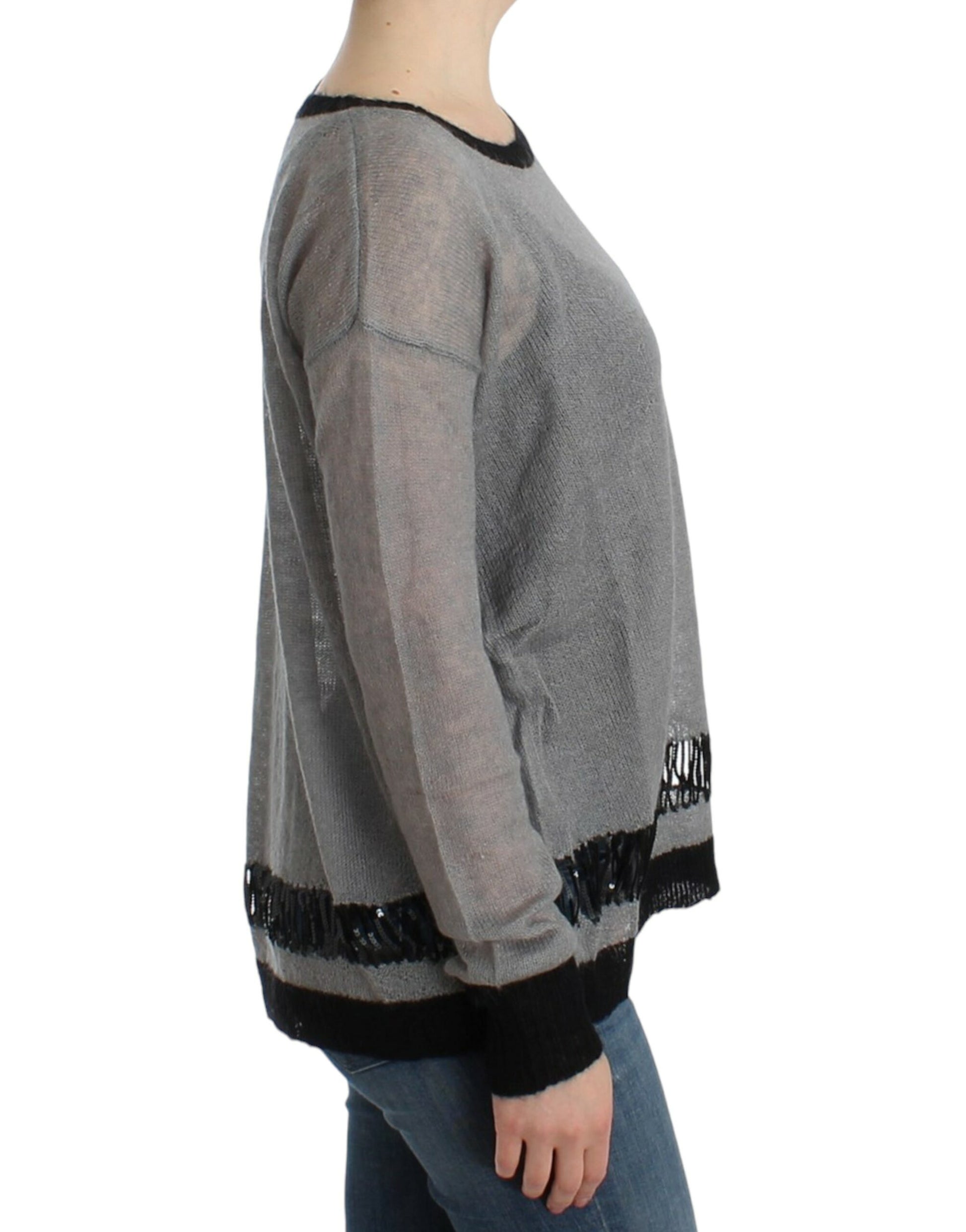 Long sleeve sweater worn by woman