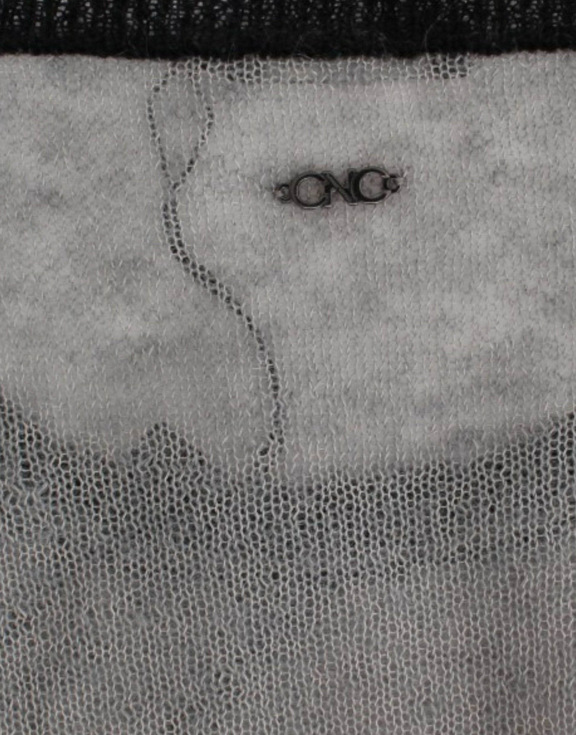Handmade quilted fabric artwork with embroidered face and glasses