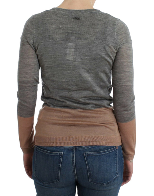 Woman wearing long sleeve shirt and jeans