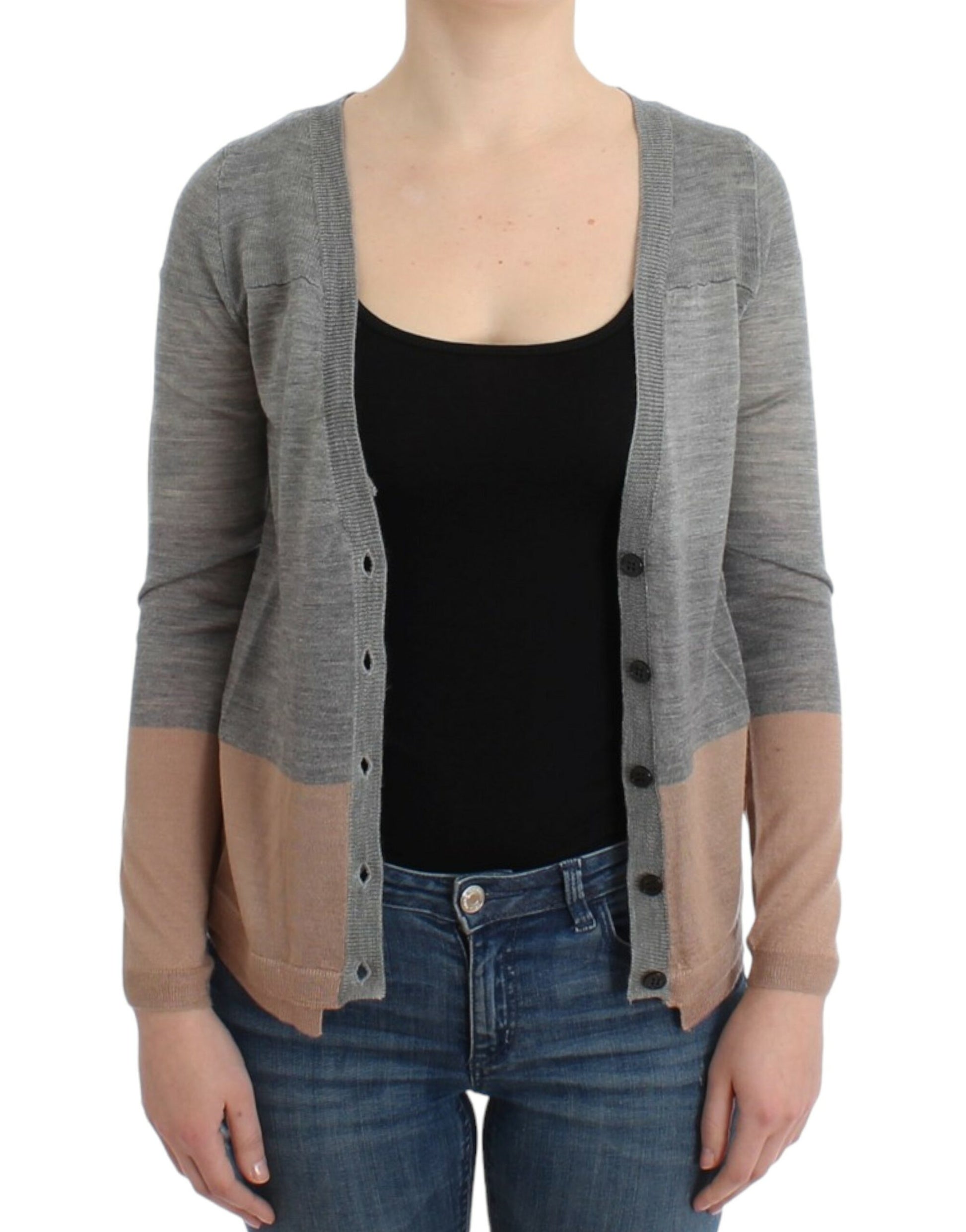 Woman wearing a gray cardigan over black top