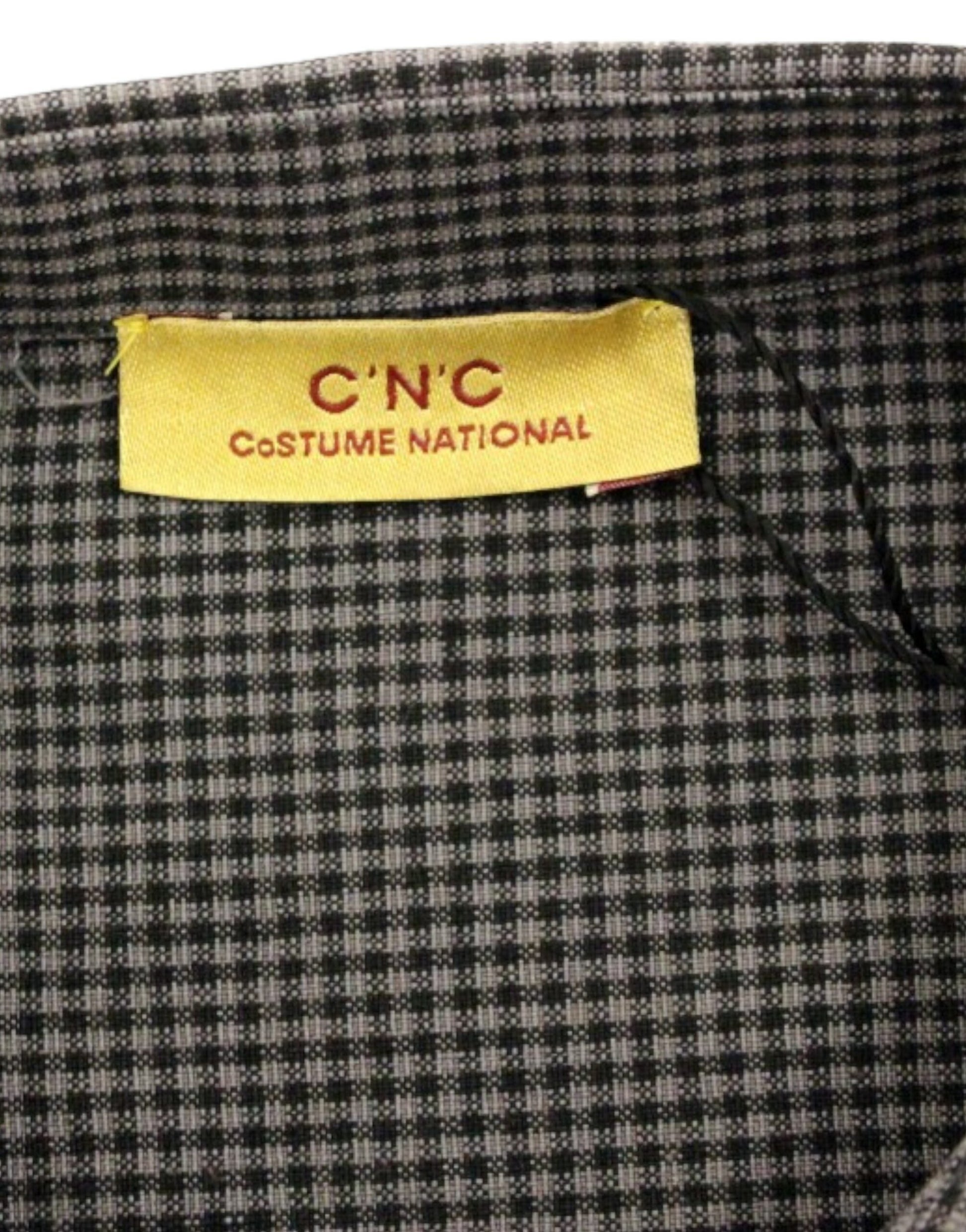 Plaid fabric with yellow tag reading "CUSTOM NATIONAL"