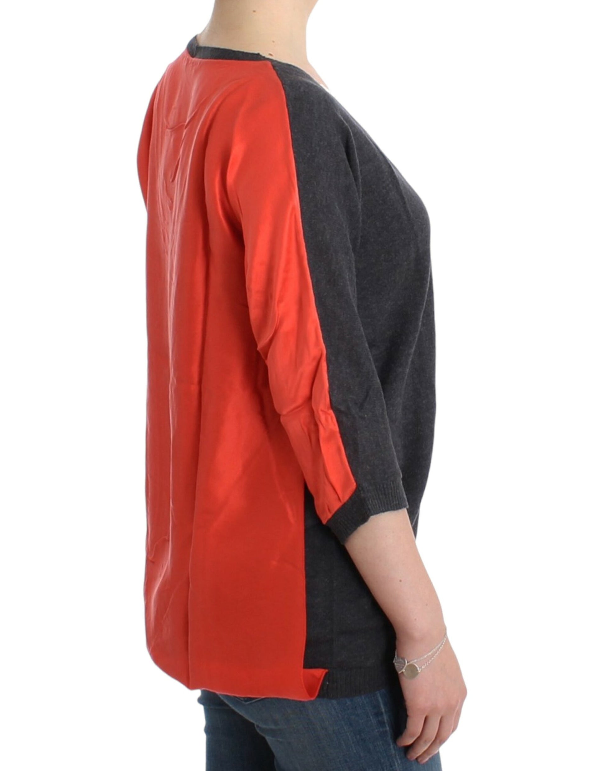 Red and black jacket on woman's back