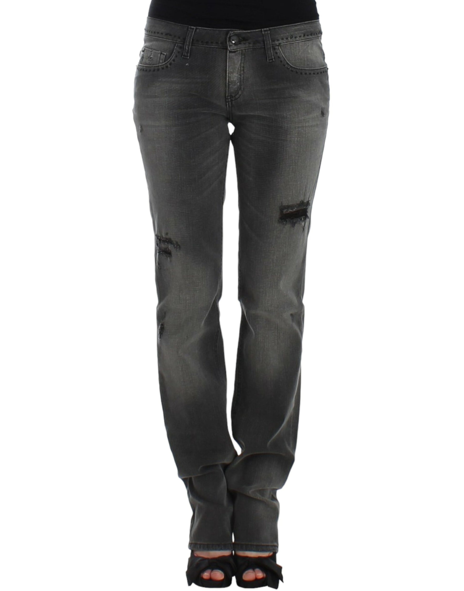 Pair of women's jeans with distressed areas and zipper details