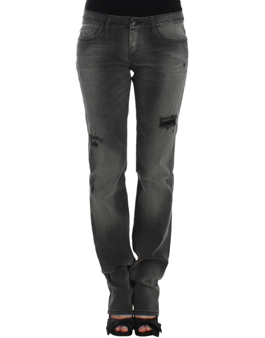Pair of women's jeans with distressed areas and zipper details