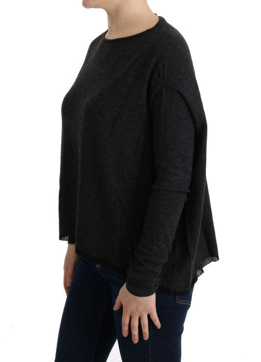 Long sleeved black sweater with lace detailing on front