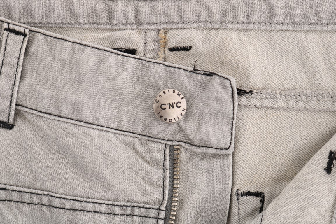 Denim jeans with button closure