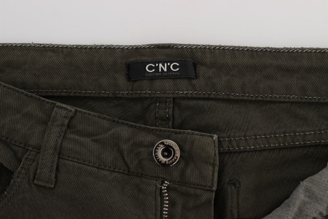 Pair of dark green cargo pants with visible brand label