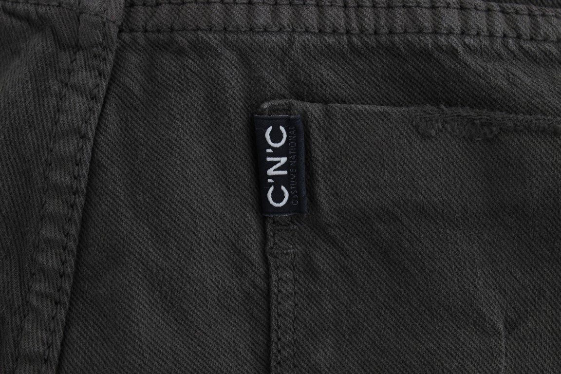 Pair of dark jeans with a white label on the waistband
