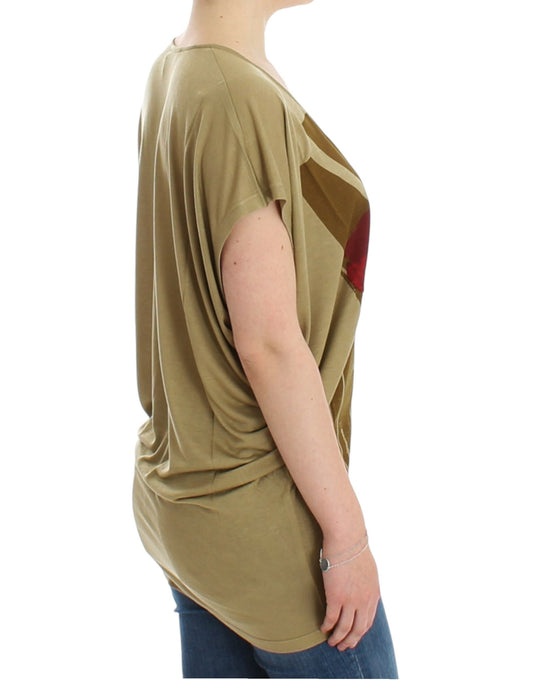 Woman wearing olive green top with ruffled sleeves