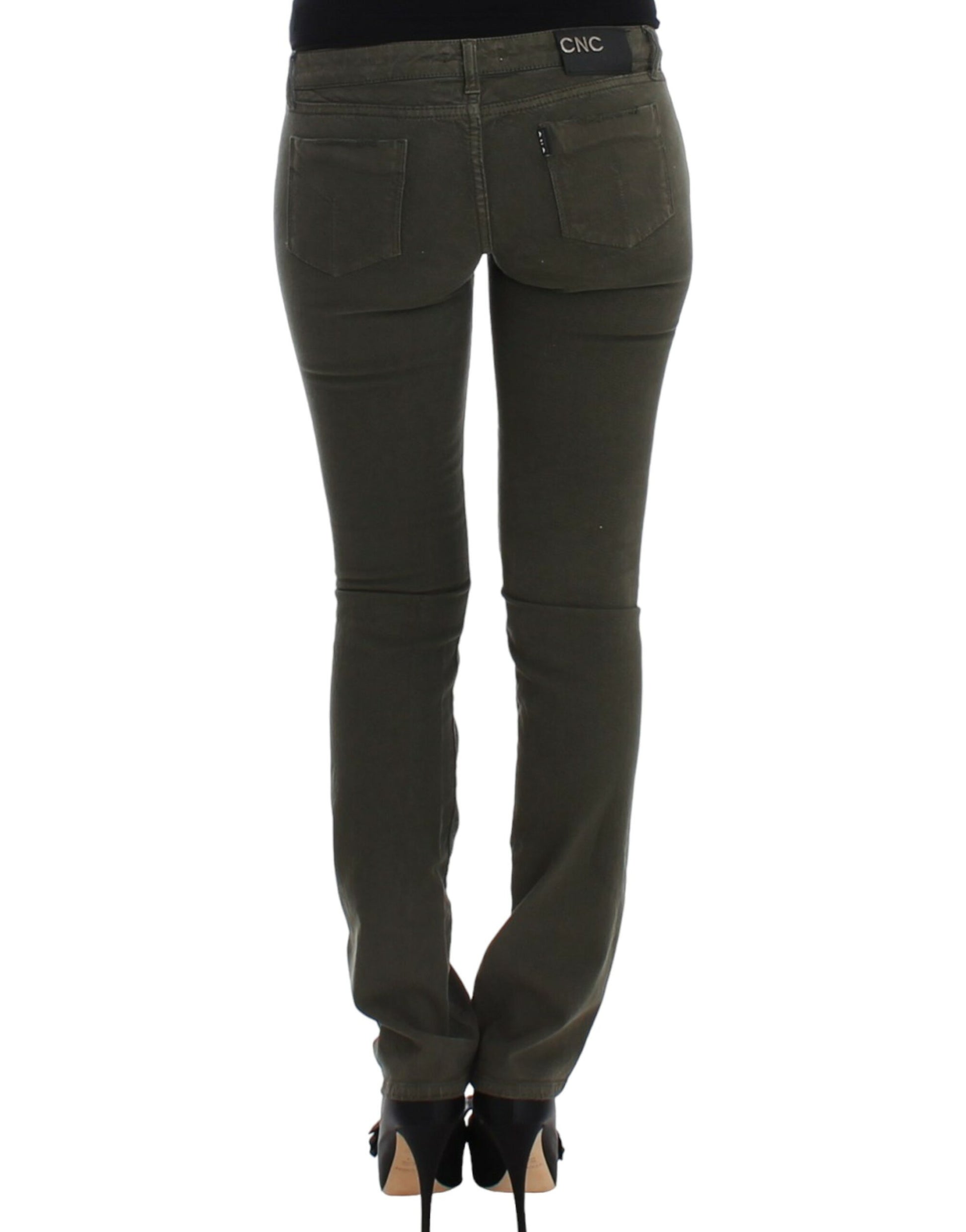 Pair of women's jeans with faded wash and zippered pockets
