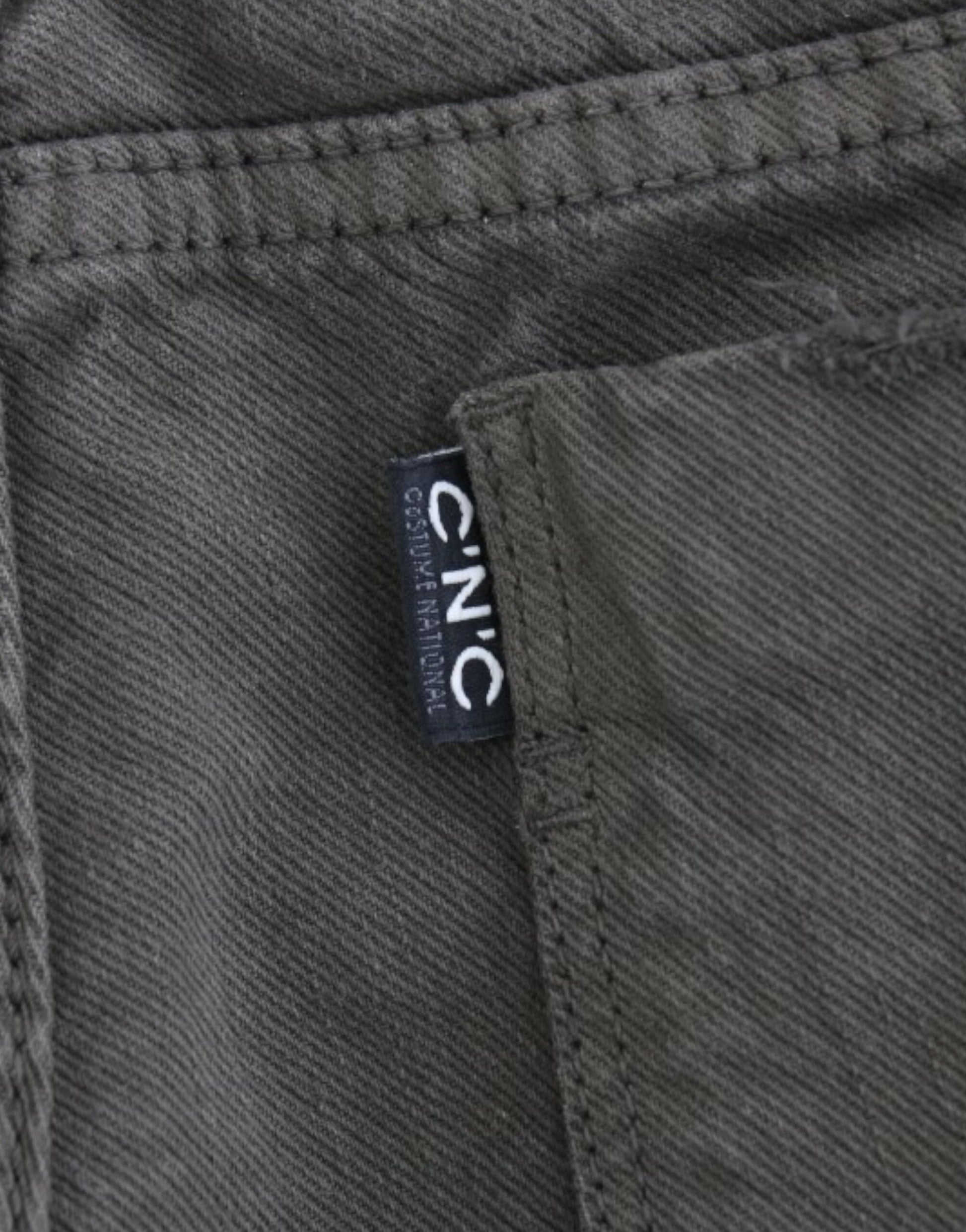 Pair of men's jeans with a visible brand label on the waistband
