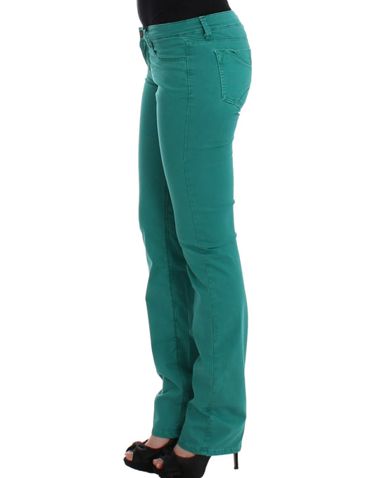 Woman wearing green pants and black top