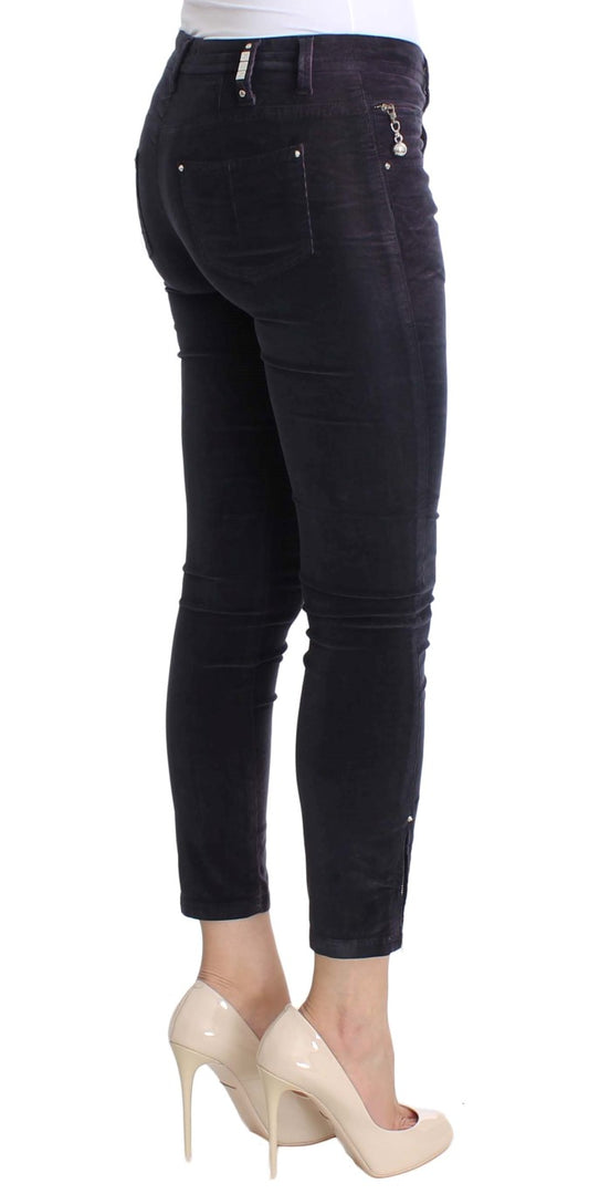 Pair of dark blue jeans with zipper detailing on legs