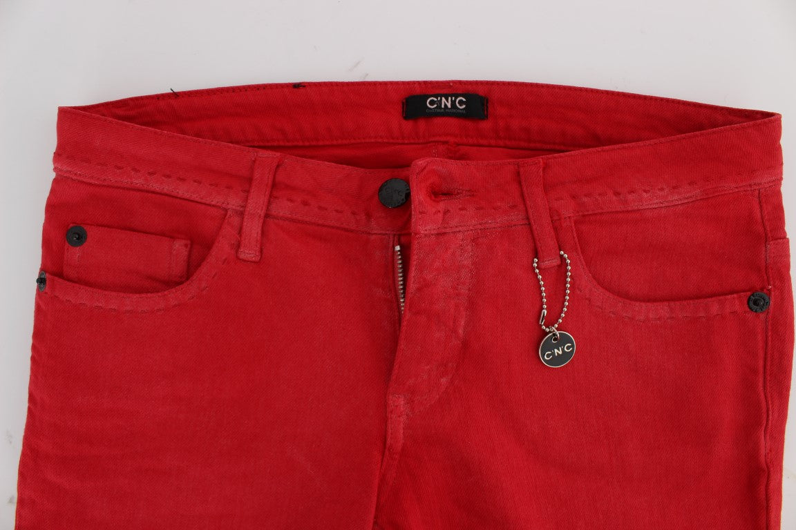 Red jeans on a white surface