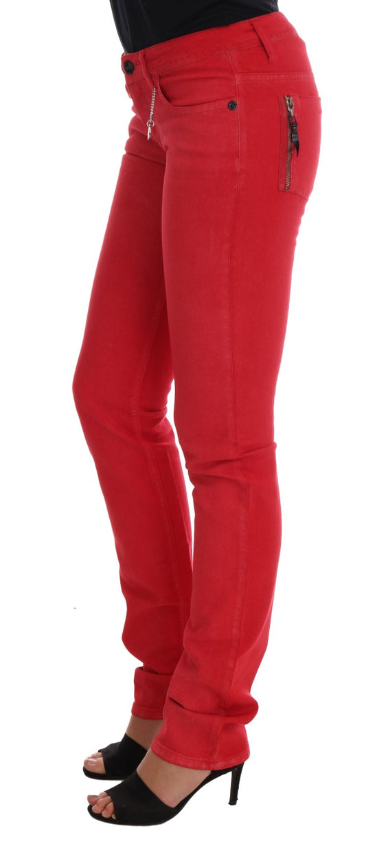 Red skinny jeans on a model