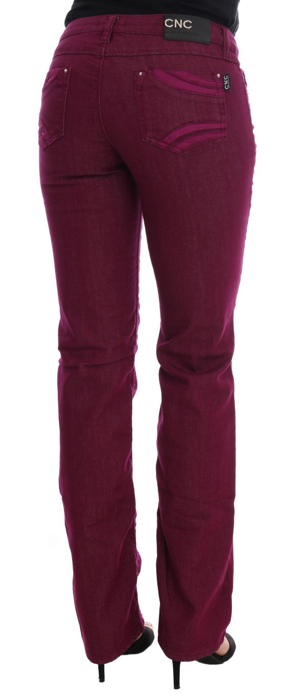 Pair of dark purple skinny jeans on a mannequin