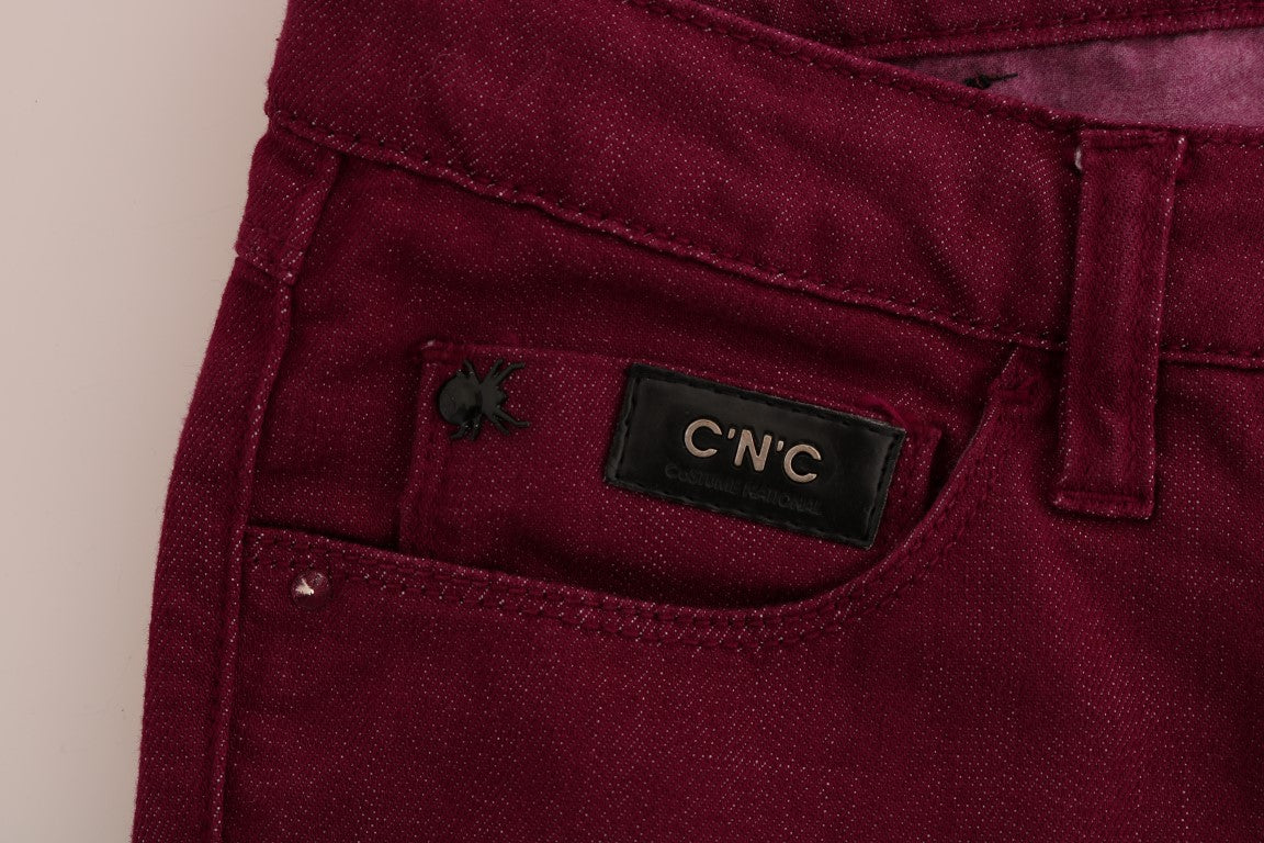 Red jeans with a black label on the back pocket