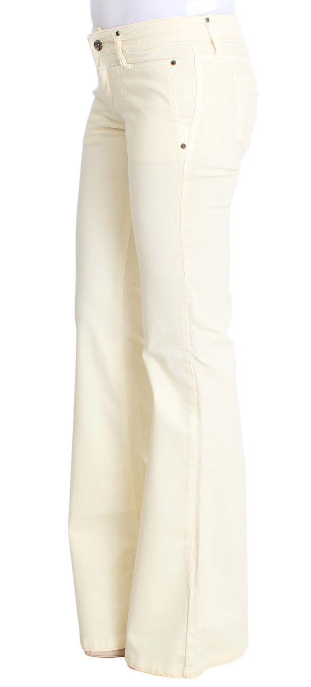 Pair of women's flared jeans in a light yellow color