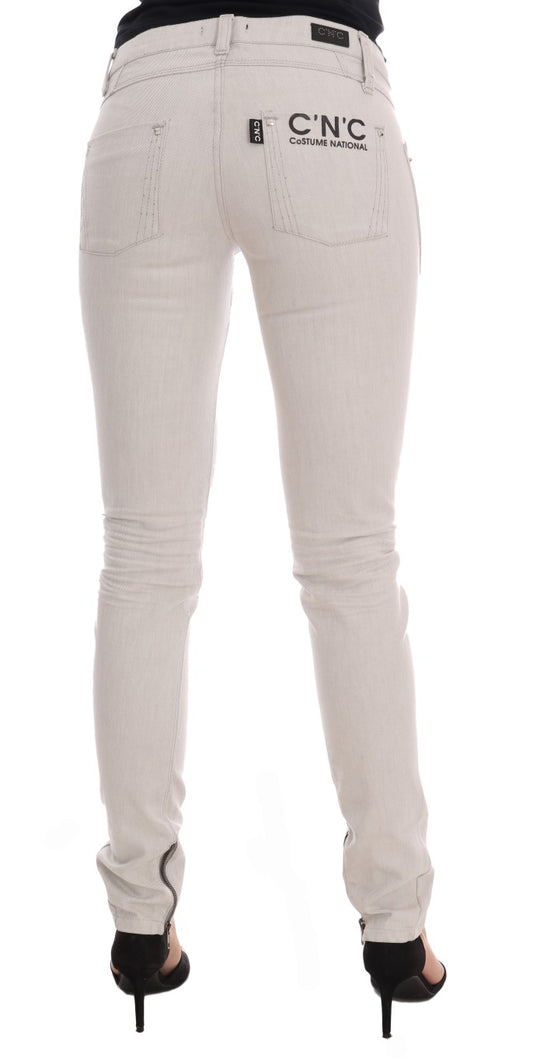 Pair of light beige women's jeans with black logo on back