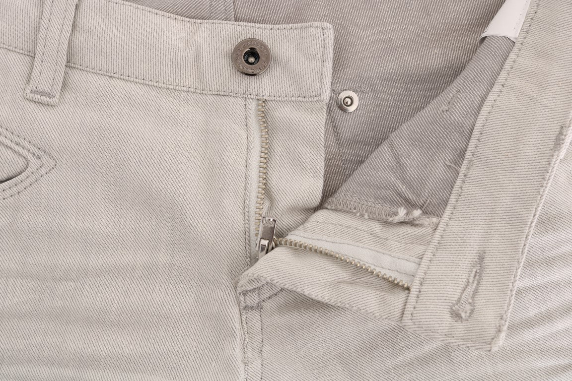 Pair of light grey jeans with button closure