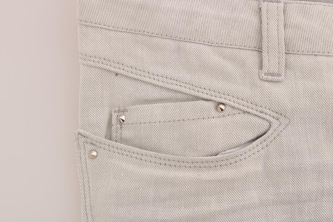 Pair of light beige jeans with front pocket detailing