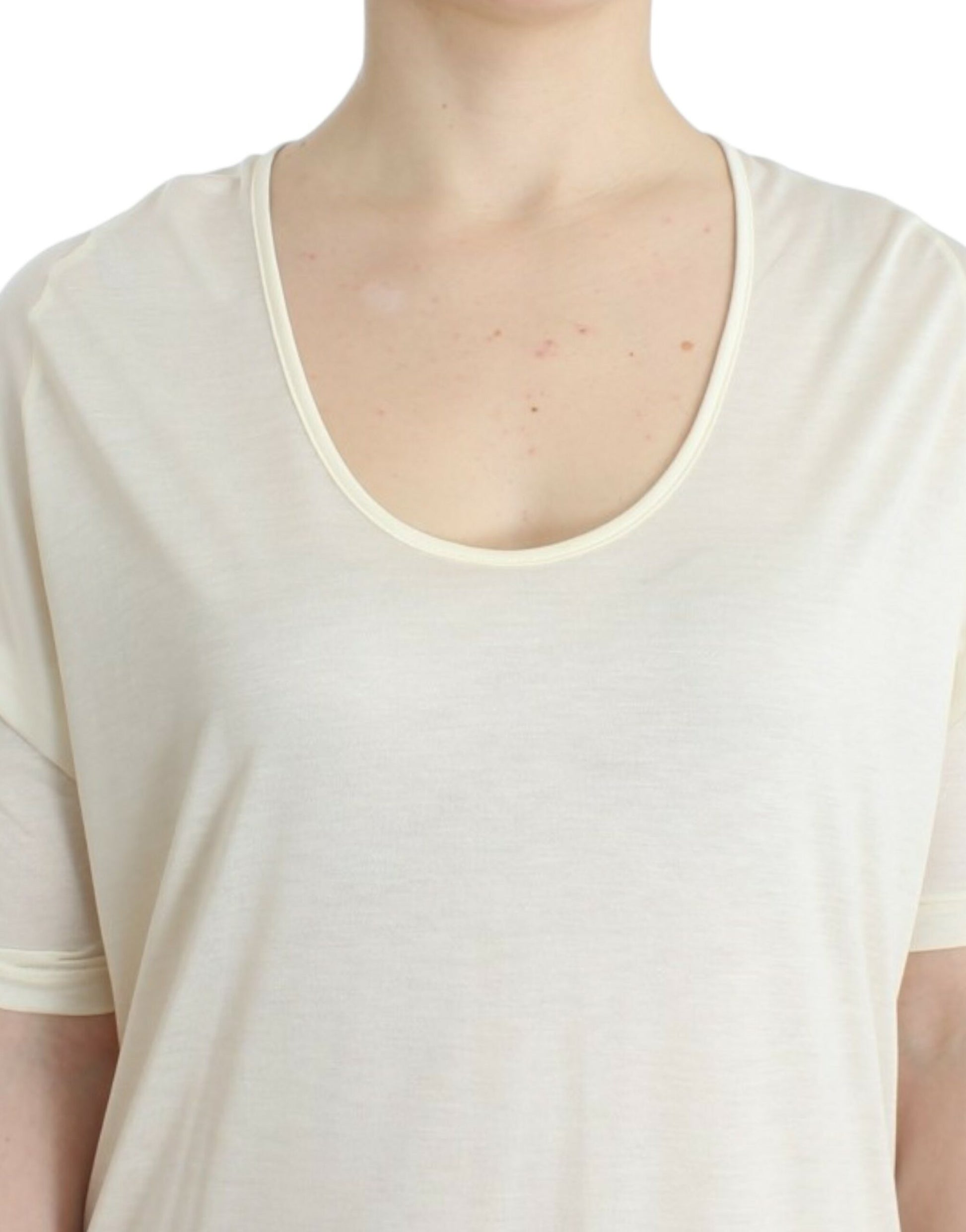 Long sleeve beige top with scoop neckline