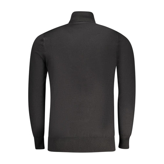Black turtleneck sweater on a mannequin