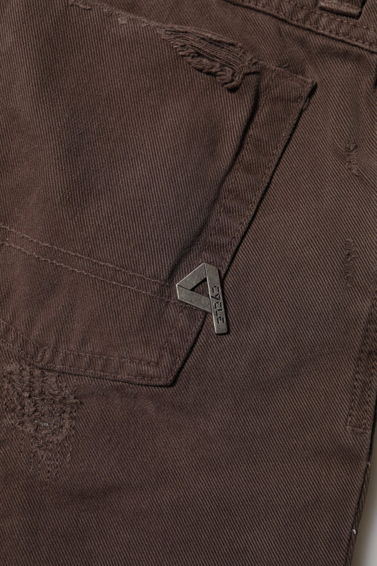 Brown denim jeans with a small silver logo on the right side of the waistband
