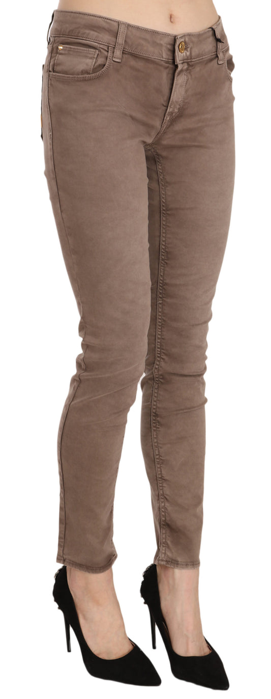 Pair of women's jeans with distressed design on legs