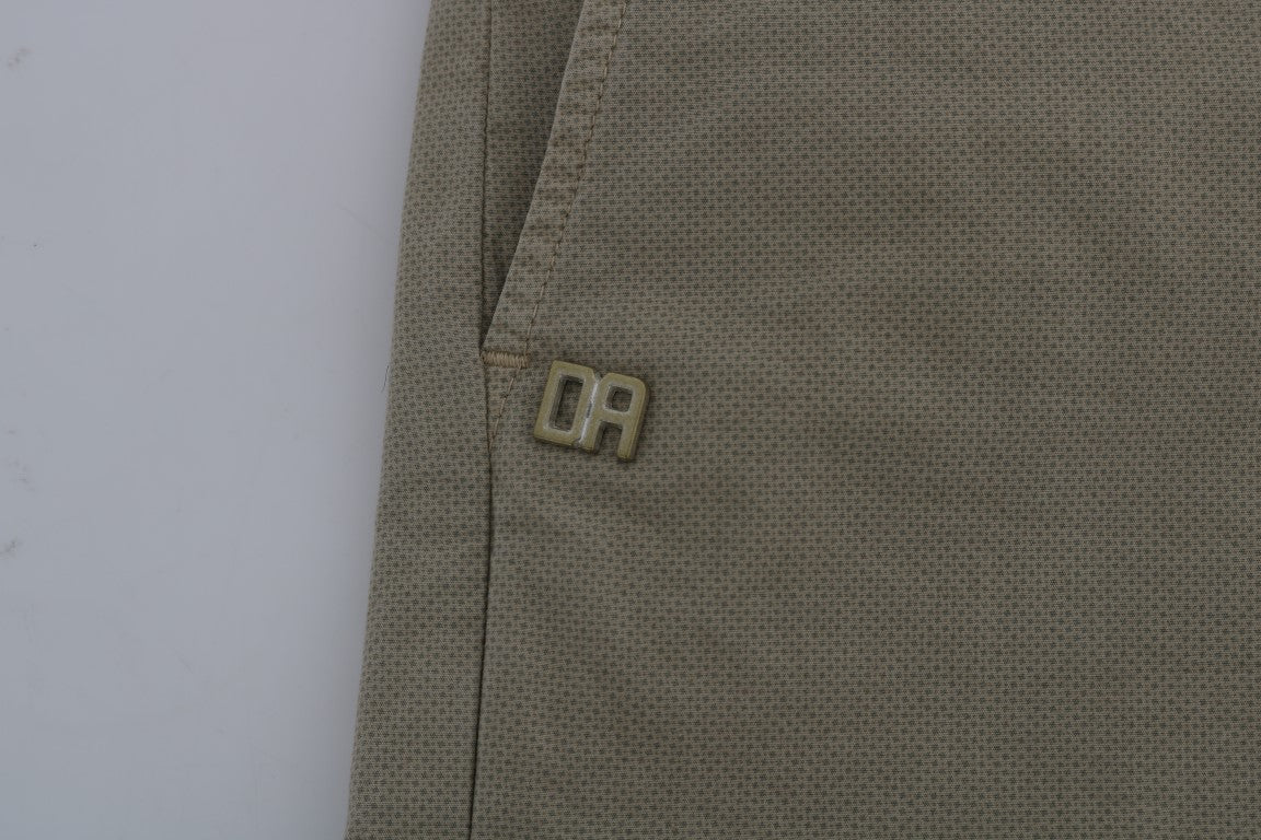Tan fabric with embroidered logo on cuff